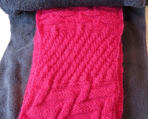 sjaal oprollen in een handdoek